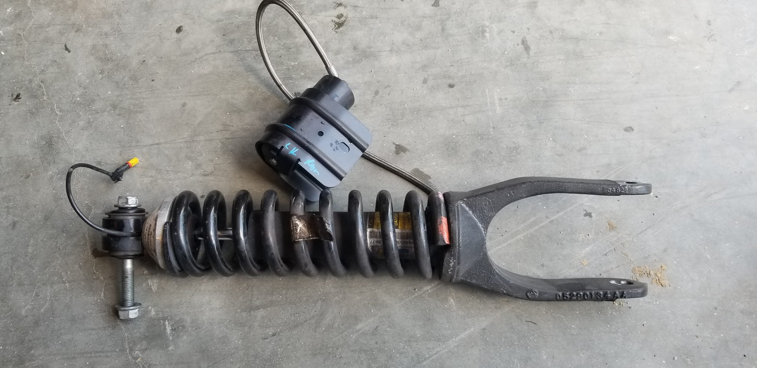 Gen 5 rear dual mode shock assm